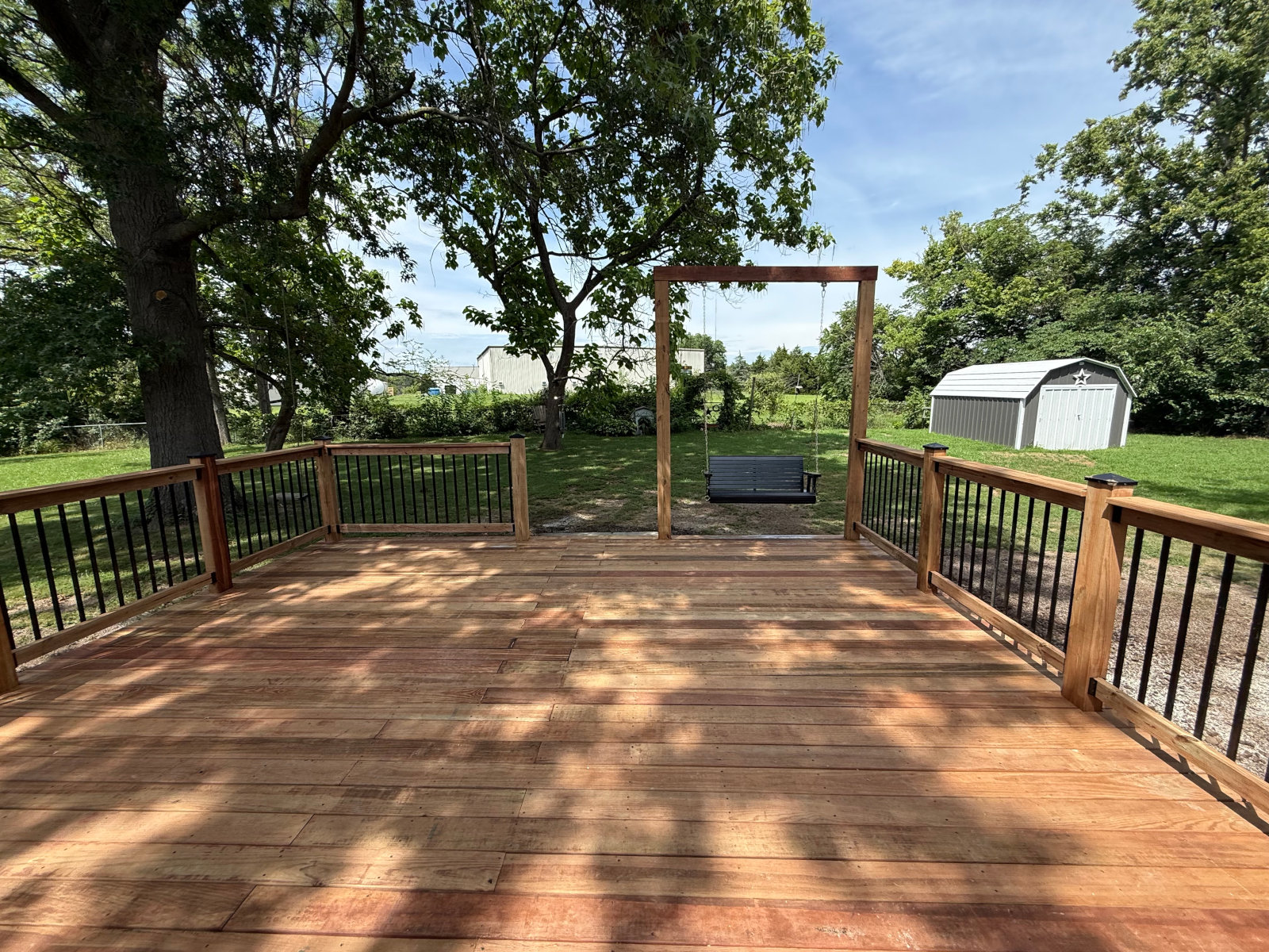 Full Deck Rebuild Featuring New Concrete Pads and Swing